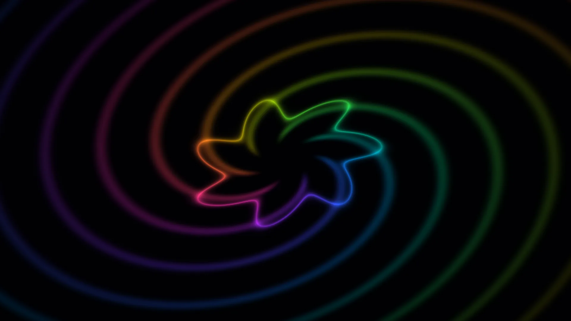 Chromatic spiral rings on a black field — free 3840x2160 4K wallpaper image