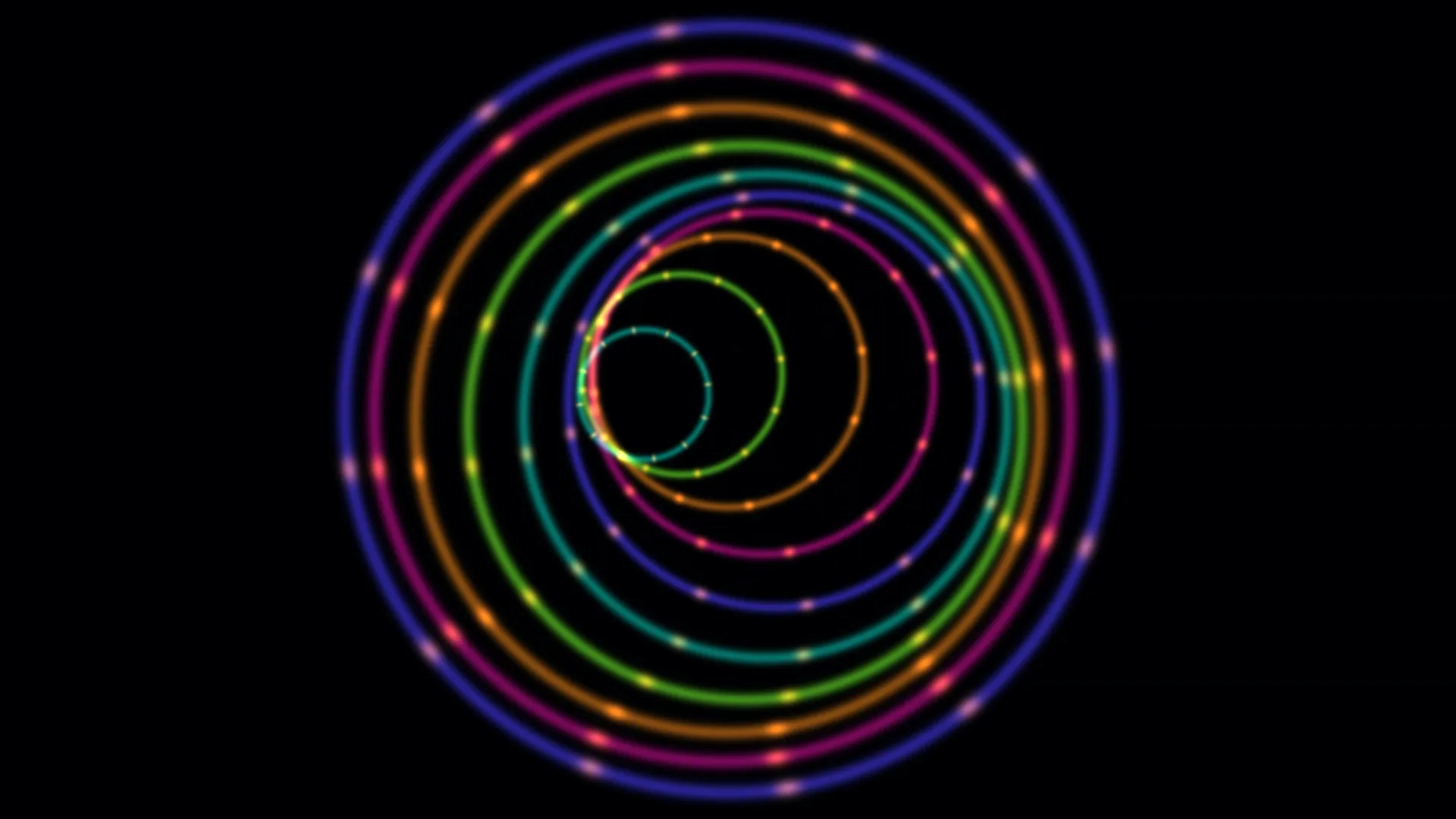 Concentric neon rings on a black field — free 3840x2160 4K wallpaper image