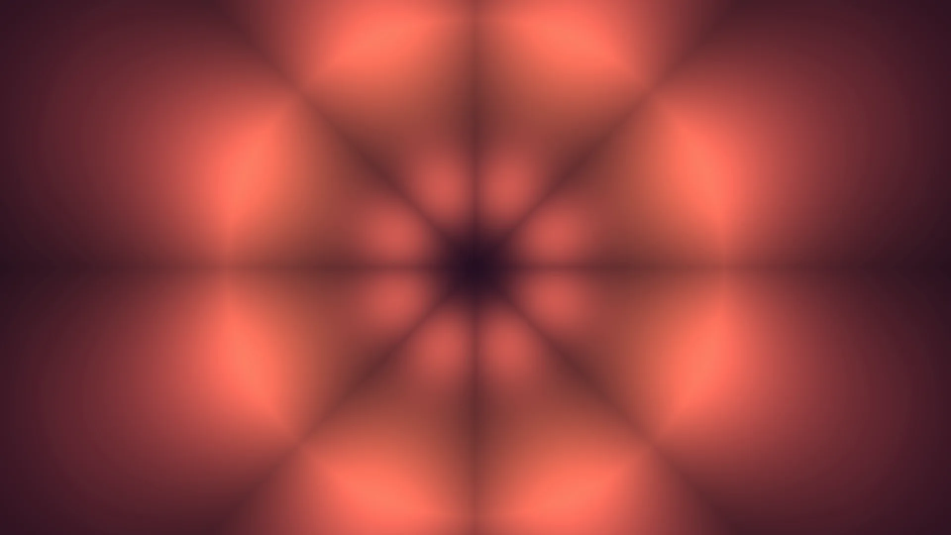 Coral radial glow with faceted symmetry — free 3840x2160 4K wallpaper image