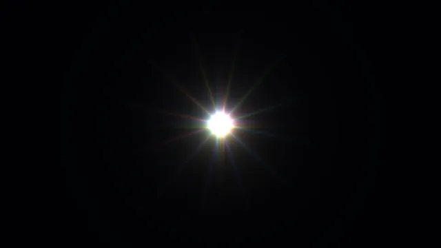 Prismatic radial flare on a black field — free 3840x2160 4K wallpaper image